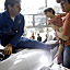 Jay Tustin (left) of Hawkes Ocean Technologies talks with...