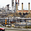 Motorists on Interstate 580 drive past the Chevron refine...