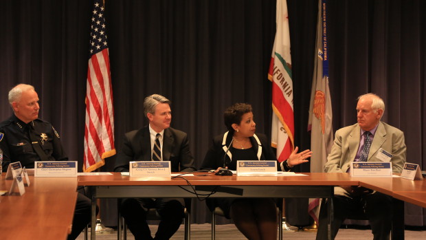 U. S. Attorney General Loretta Lynch address community leaders of Richmond including Mayor Tom Butt (right) and Police Chief Chris Magnus (far-left). (Photo by Manjula Varghese)