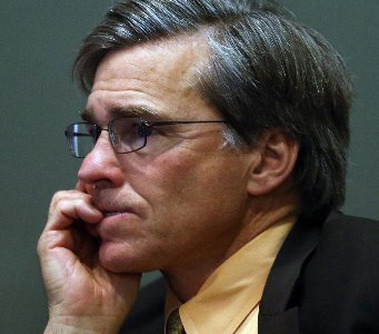 City Manager Bill Lindsay listens to speakers during a council meeting, which started late, at the City Council Chambers in Richmond, Calif., on Tuesday,