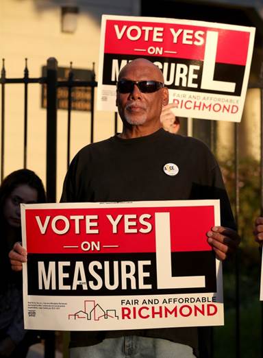 Vincent Justin listen to speakers as tenants rally at the Creekview Apartments in Richmond, Calif., on Thursday, Oct. 6, 2016. Justin recently moved out after living there for 22 years. More than 100 renters are being evicted from the apartments. Tenants are demanding that the owner, PMI Properties, halt evictions and let the remaining tenants stay in the recently refurbished apartments. (Jane Tyska/Bay Area News Group)