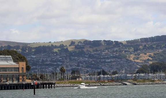 The 5-acre “Richmond Riviera” site (beyond the boat) would inlcude 59 single-family homes in an area some feel would be better served by apartments. Photo: Liz Hafalia, The Chronicle