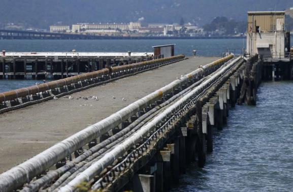 Pipelines from the old Navy fuel depot line a pier at Point Molate in Richmond, Calif. on Friday, July 15, 2016. Photo: Paul Chinn, The Chronicle