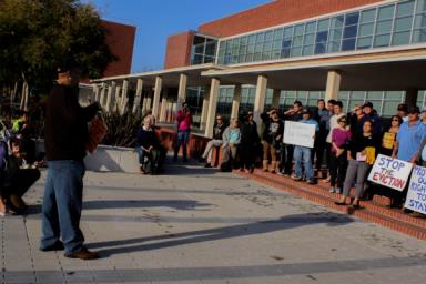 Creekview Apartments tenant Vincent Justin addresses the assembled crowd. Photo by Abner Hauge.