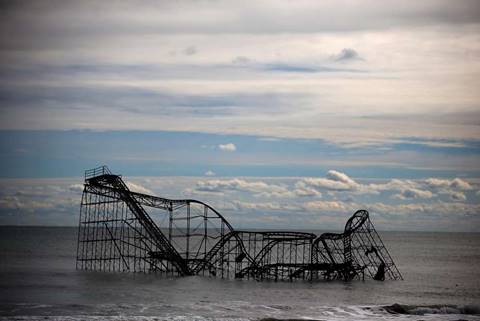 Atlantic Ocean waters flood a roller coaster after Superstorm Sandy hit on Nov. 1, 2012, in Seaside Heights, N.J. A Bay Area project will explore ways to lessen the effects of sea-level rise. Photo: Mark Wilson, Getty Images