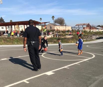 Description: Description: Image may contain: one or more people, basketball court and outdoor