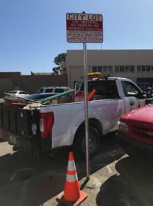 Lot Sweeping sign install at lot entrance to Richmond Works