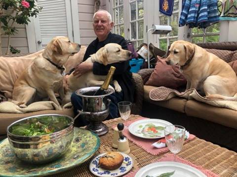 Image may contain: Tom Butt, sitting and dog