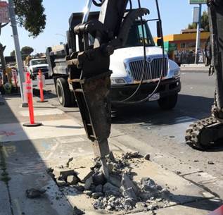 Forde jackhammering through sidewalk RAA