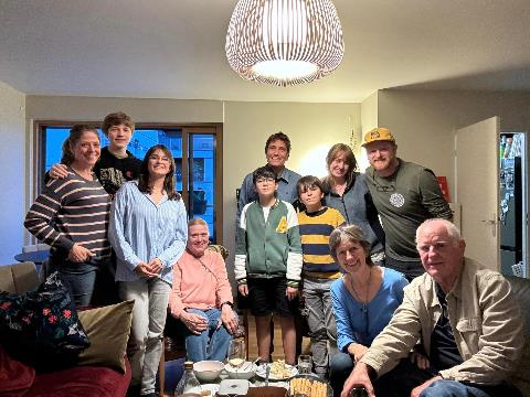 A group of people posing for a photo Description automatically generated