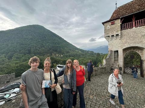A group of people posing for a picture Description automatically generated